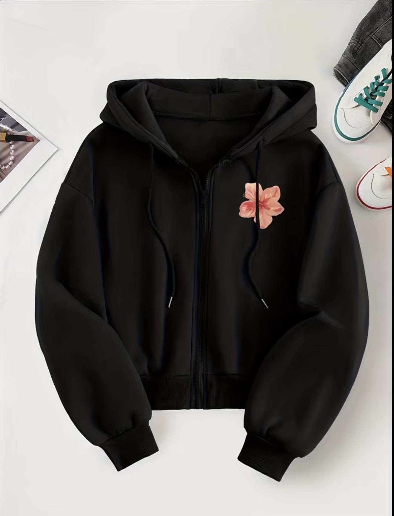 Women's zipper hoodie with a small pink floral graphic on the left chest and a drawstring hood.