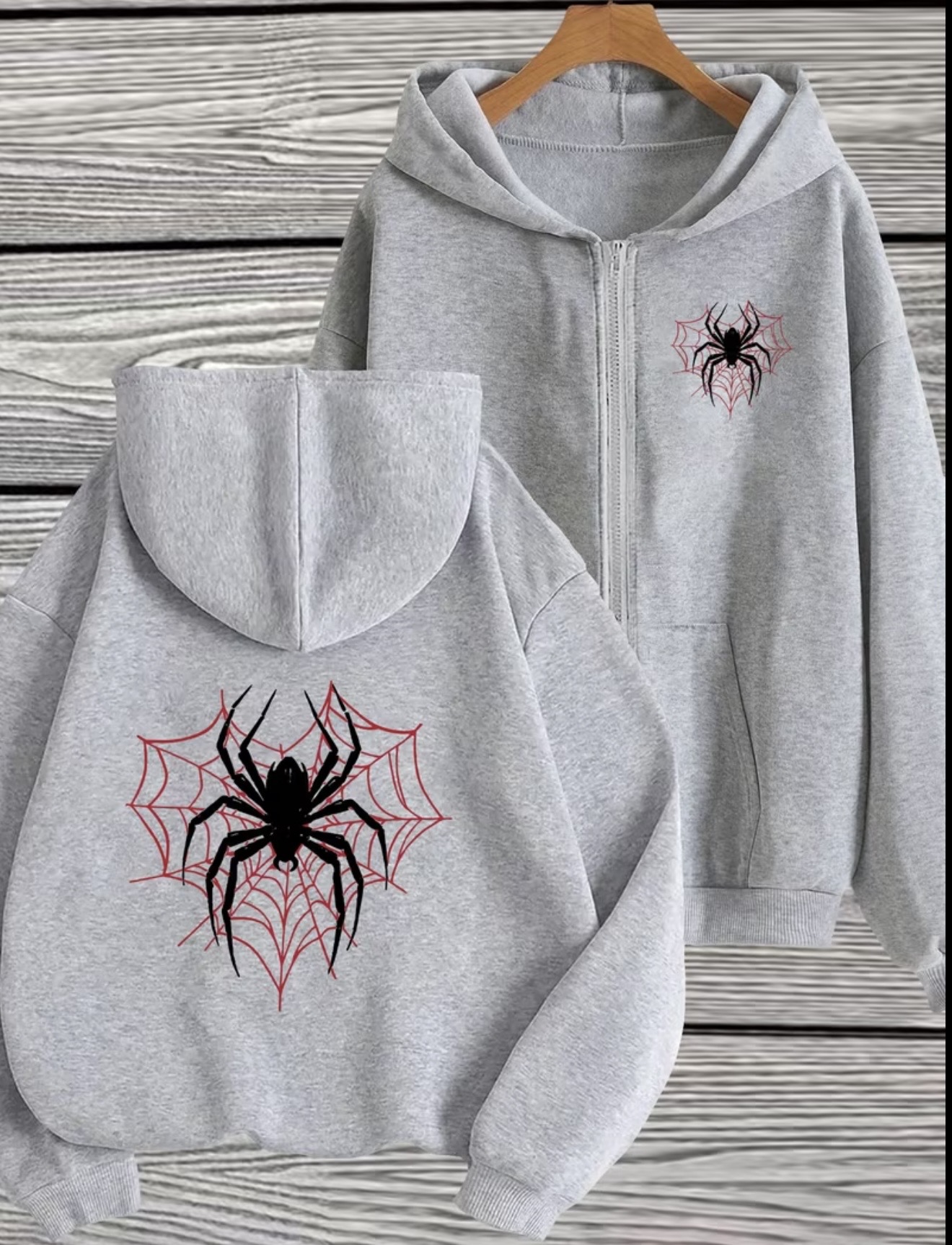 Y2K-style full-zip hoodie featuring a black spider and red spiderweb graphic on the back and a smaller matching chest print.